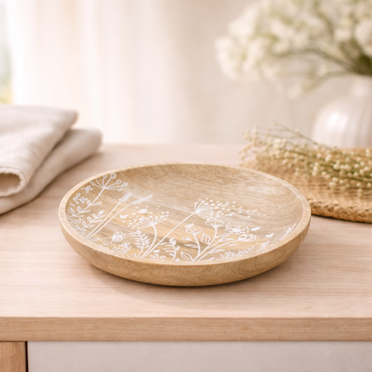 Wooden tray with floral design on a wooden surface